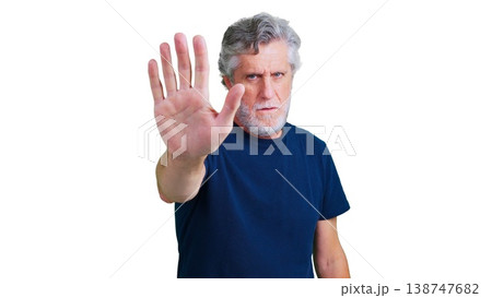 Senior man making stop gesture expressing rejection Senior man making stop gesture expressing rejection 138747682
