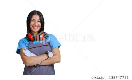 Female construction worker smiling wearing protective gear 138747721