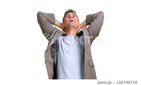 Businessman relaxing hands behind head feeling relief 138748156