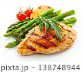 Grilled chicken breast with roasted green asparagus rosemary herb and vegetables isolated on white background 138748944