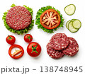 Raw beef burger patties with sesame seeds lettuce tomato slices and cucumber arranged on white background 138748945