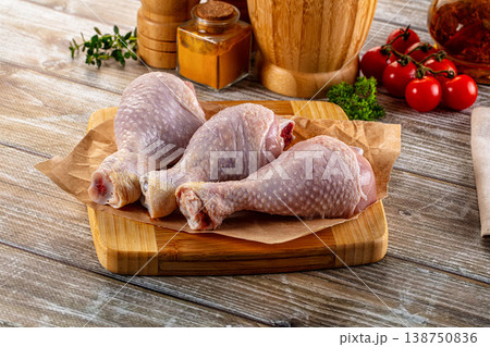 Fresh raw chicken drumstick over board Fresh raw chicken drumstick over board 138750836