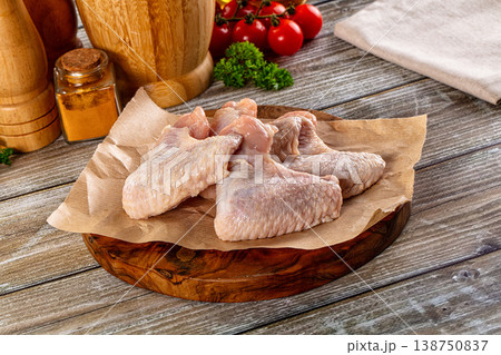 Fresh raw chicken wings over board 138750837