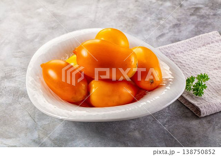 Sweet juicy ripe yellow tomato Sweet juicy ripe yellow tomato 138750852