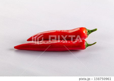 Raw fresh red paprika pepper Raw fresh red paprika pepper 138750961