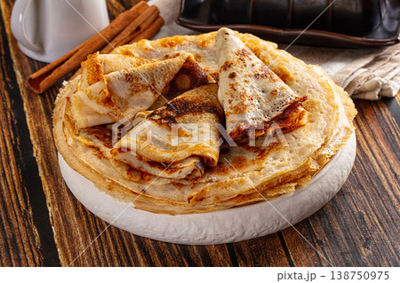 Thin homemade golden pancaces stack 138750975