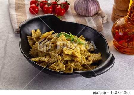 Italian green pasta farfalle with pesto Italian green pasta farfalle with pesto 138751062