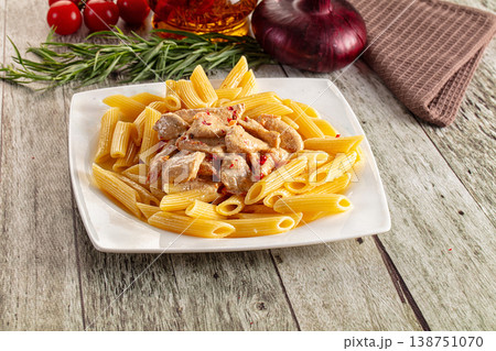 Pasta penne with chicken in cream sauce Pasta penne with chicken in cream sauce 138751070