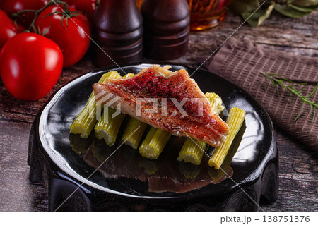 Steamed grouper fillet with celery Steamed grouper fillet with celery 138751376