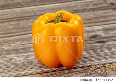 Ripe yellow sweet peppers on a dark textured background 138751392