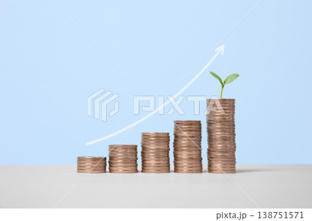 Young green seedlings plant growing on increasing coin stacking for money saving deposit and investment dividend growth concept, goals achievement and business success Young green seedlings plant growing on increasing coin stacking for money saving deposit and investment dividend growth concept, goals achievement and business success 138751571