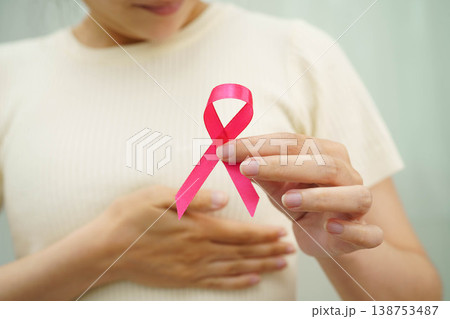 Asian woman with pink ribbon for October world breast cancer day. 138753487