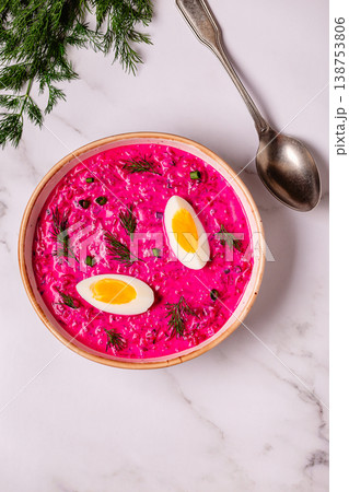 Cold summer soup of beets, yogurt, cucumbers, eggs and dill. 138753806