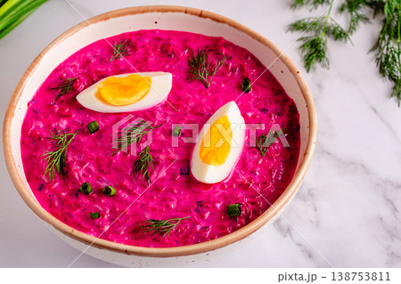 Cold summer soup of beets, yogurt, cucumbers, eggs and dill. 138753811
