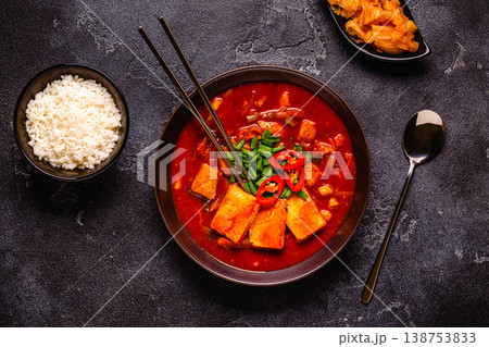 Korean traditional food, spicy kimchi soup (kimchi tige) with pork and tofu cheese. 138753833