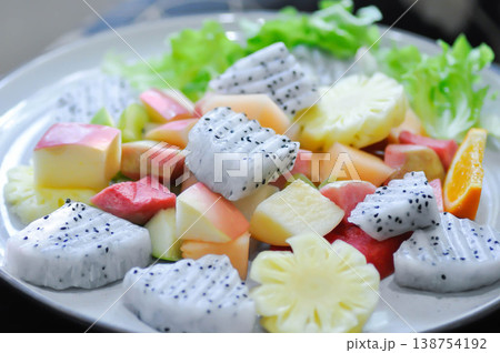 fruit salad or fruit and vegetable salad or dragon fruit , pineapple and apple salad fruit salad or fruit and vegetable salad or dragon fruit , pineapple and apple salad 138754192