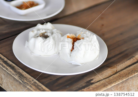 Chinese stuffed bun , steamed dumpling or steamed bun or Chinese bun 138754512