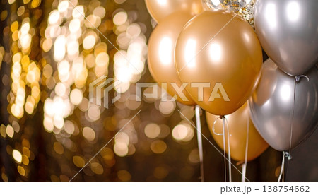 Gold and silver party balloons with sparkling lights background 138754662