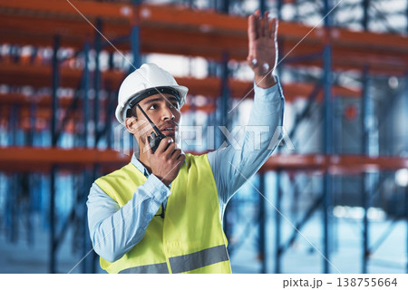 Man, radio and thinking in warehouse for logistics, storage site and contact with safety inspection. Person, communication and tech with conversation, helmet and shipping at distribution plant 138755664