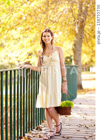 Happy woman, basket or park in nature by fence on holiday vacation in countryside or autumn. Smile, vegetables or person with healthy diet, groceries or food outdoors for fresh air, wellness or peace Happy woman, basket or park in nature by fence on holiday vacation in countryside or autumn. Smile, vegetables or person with healthy diet, groceries or food outdoors for fresh air, wellness or peace 138755730