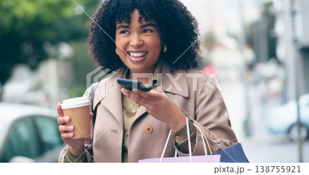 Happy woman, coffee and phone for communication for outside, city and street for commute. African, business person and smile with shopping bags while talking on mobile with app, network or internet Happy woman, coffee and phone for communication for outside, city and street for commute. African, business person and smile with shopping bags while talking on mobile with app, network or internet 138755921