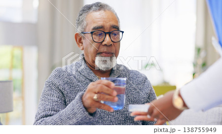 Sick, nurse or senior man in home to take pills or supplements for healthcare vitamins or wellness. Drinking water, medication tablets or caregiver nursing an old person with drugs to help cure virus Sick, nurse or senior man in home to take pills or supplements for healthcare vitamins or wellness. Drinking water, medication tablets or caregiver nursing an old person with drugs to help cure virus 138755949