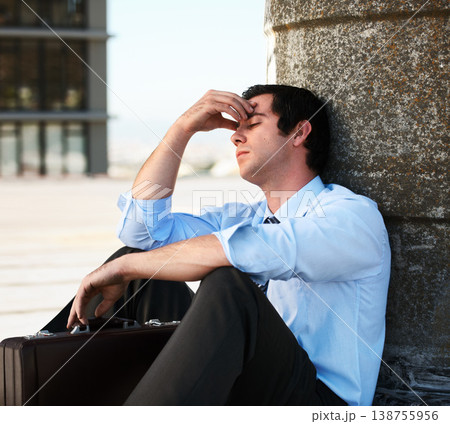 Businessman, headache or outdoor with stress, depression and anxiety on roof of building for crisis. Professional, person or employee with suitcase, mental health or migraine for problem or suffering 138755956