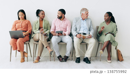Waiting room, recruitment and people with notebook, laptop or talking of business networking, HR opportunity and social media. Diversity, job search and Human Resources group of men or women in chair Waiting room, recruitment and people with notebook, laptop or talking of business networking, HR opportunity and social media. Diversity, job search and Human Resources group of men or women in chair 138755992