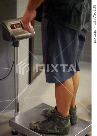 Scale, weighing and body, legs and person with progress in diet and lose weight, fitness and numbers in gym. Exercise, health and wellness with growth and development in weightloss and results 138756139