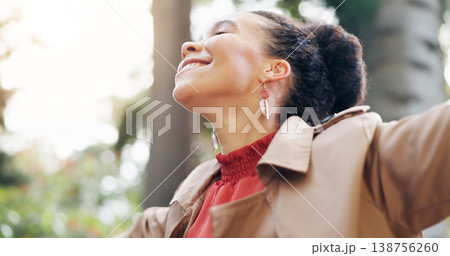 Freedom, happy and business woman in a park with vacation, celebration or positive mindset outdoor. Smile, energy and female entrepreneur in a forest for holiday, fresh air and excited in nature Freedom, happy and business woman in a park with vacation, celebration or positive mindset outdoor. Smile, energy and female entrepreneur in a forest for holiday, fresh air and excited in nature 138756260