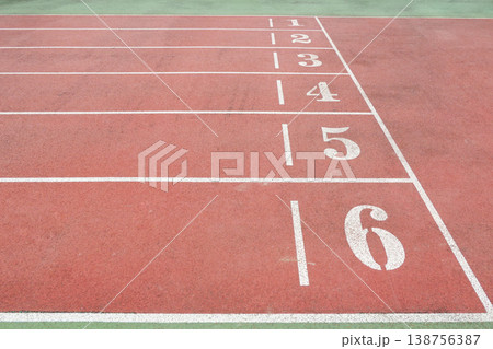 a Red Running Track with White Lane Markings a Red Running Track with White Lane Markings 138756387