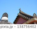 Oriental Magpie Perched on Traditional Korean Hanok Tiled Roof 138756402