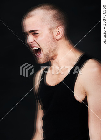 Frustrated, stress and blur of man shouting in studio isolated on a black background. Anger, anxiety and person screaming for mental health crisis, psychology or crazy trauma, depression or bipolar Frustrated, stress and blur of man shouting in studio isolated on a black background. Anger, anxiety and person screaming for mental health crisis, psychology or crazy trauma, depression or bipolar 138756550