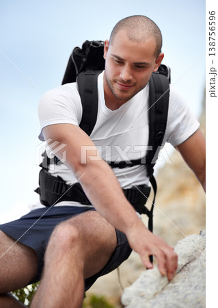 Man on rock, backpack and climbing on hiking adventure in mountain with nature hike, freedom or wellness. Travel, trekking and person in countryside, natural outdoor journey and hanging on cliff. Man on rock, backpack and climbing on hiking adventure in mountain with nature hike, freedom or wellness. Travel, trekking and person in countryside, natural outdoor journey and hanging on cliff. 138756596