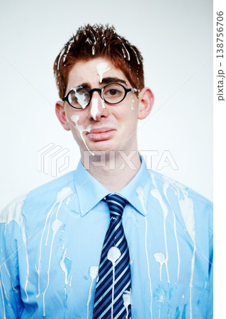 Portrait, bird poo and a business man in studio on a white background for an unlucky or misfortunate mishap. Sad, depression and bad luck with an unhappy young employee in glasses after an accident Portrait, bird poo and a business man in studio on a white background for an unlucky or misfortunate mishap. Sad, depression and bad luck with an unhappy young employee in glasses after an accident 138756706