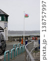 Welsh flag flying over caernarfon bank quay dock 138757997