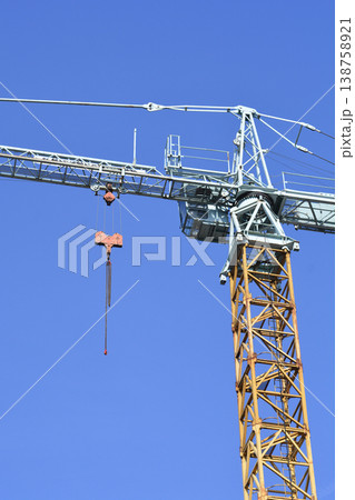 Tower Crane Against Clear Blue Sky 138758921