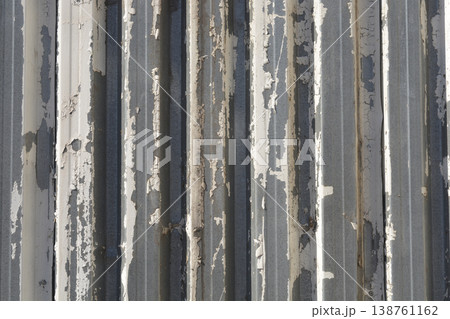 Corrugated Metal Surface with Peeling White Paint Corrugated Metal Surface with Peeling White Paint 138761162