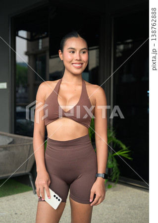 Thai Fitness Influencer Standing Outdoors After Workout Gym Training Done Concept Thai Fitness Influencer Standing Outdoors After Workout Gym Training Done Concept 138762888