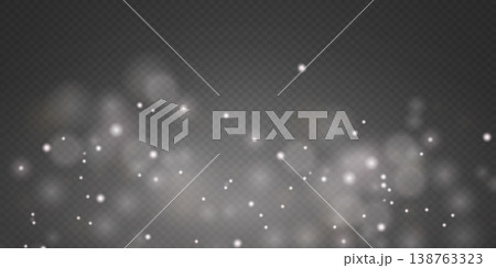 Soft glowing bokeh light effect with sparkling white particles creating a magical overlay 138763323