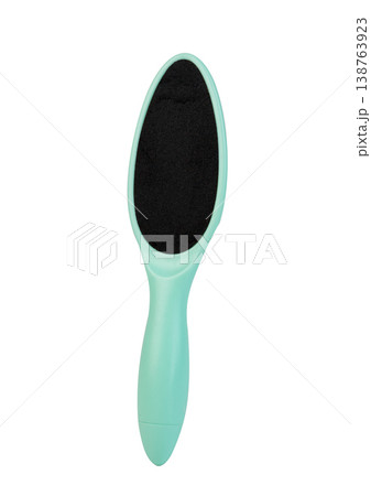 Professional turquoise foot rasp with black abrasive surface isolated on white background, pedicure tool. 138763923