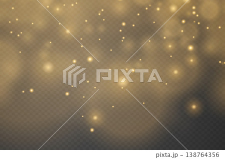 Golden sparkling dust particles creating a light overlay effect background 138764356