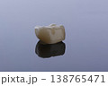 High-quality zirconia dental crown on white background. Dental ceramic crown professional dental lab 138765471