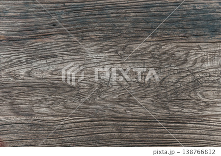 Rustic weathered wood texture with detailed grain and natural cracks. High quality photo Rustic weathered wood texture with detailed grain and natural cracks. High quality photo 138766812