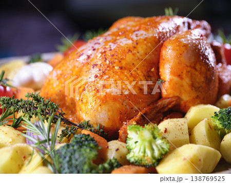 Traditional Rustic Supper Featuring Crispy Skin Chicken And Seasoned Potatoes Traditional Rustic Supper Featuring Crispy Skin Chicken And Seasoned Potatoes 138769525