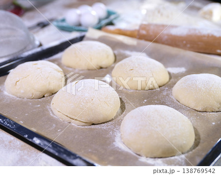 Gentle Morning Rays Illuminate Textured Work Surface For Baking Preparations Gentle Morning Rays Illuminate Textured Work Surface For Baking Preparations 138769542