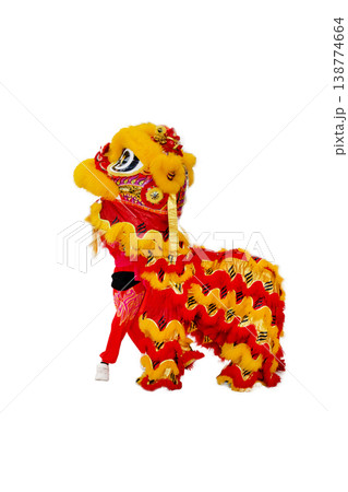 Top view of lion dance red and yellow color Dress are standing on white background, focus selective 138774664