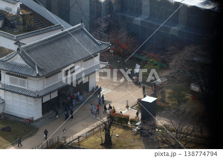 The view of Himeji City from the windows at the top of the tenshu or castle keep of Himeji Castle in Japan 138774794