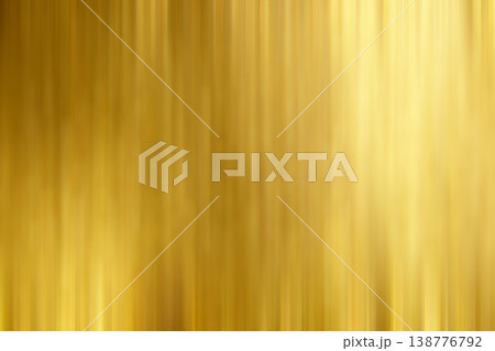 Golden metallic background with vertical blur texture for luxury design and elegant abstract compositions 138776792