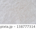 Close-up of soft white mohair fabric with delicate fibers and fluffy texture. 138777314